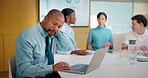 Businessman, stress and meeting with laptop for deadline, schedule tasks or agenda in office. Man, employee or bad posture with team on computer for overworked strain, pressure or muscle tension