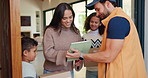 Tablet, delivery and man with mom in home with package for shipping, order and school supplies. Family, front door and person with tech for customer signature for parcel, cargo and box for children