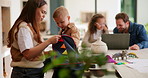Backpack, help and mom with child in kitchen to prepare for school, morning routine and learning. Family, parents and mother with boy for packing bag for development, education and ready for academy