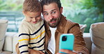 Silly, father and child with selfie at house for photography, social media and family blog. Goofy, man and embrace kid for affection, profile picture update and capture moment with funny expression