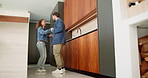 Dance, love and father with girl in kitchen for happy, celebration and bonding. Playful, movement and music with man and child in family home for support, weekend and holding hands for entertainment