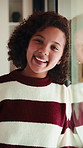 Girl, happy and child with face in home at window, memory and thinking with reflection in morning. Kid, smile and portrait by glass for nostalgia, perspective or confidence at house in Costa Rica