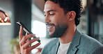 Businessman, talk and speaker phone in office with voice note, marketing plan and feedback for project. Person, recording online chat and smile in agency with tech, contact and brand campaign update.