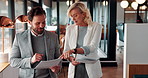 Walking, talking and business people with paperwork in office for accounting budget, help or advice. Document, review and team discussion in workplace for finance, bookkeeping feedback or meeting