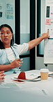Woman, presentation or meeting with graphs for analyst, brainstorming or discussion in office. Business people, project management and proposal with paperwork for feedback, agenda or stats for team