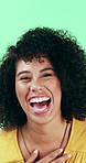 Funny, face and woman with laugh on green screen for expression, positive energy or good mood. Joke, person and cheerful for hilarious story, happy personality and comic reaction to gossip amusement