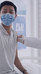 Injection, checkup and doctor with man in clinic for flu shot, treatment or vaccination. Consultation, needle and hands of healthcare worker with male patient for medical syringe for medication.