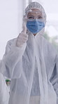 Person, face or thumbs up with hazmat suit in laboratory for disinfection, virus exposure or prevent infection. Biohazard, sanitize and woman with ppe for promoti, chemical or hazardous waste