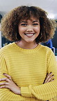 Creative, face or woman in office with arms crossed, new job or ambition in advertisement industry. Smile, portrait or branding clerk with confidence, career growth or internship in marketing agency.