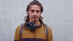 University, face or man on wall with headphones, commute or knowledge in study opportunity. Portrait, space or college student outdoor with tech, morning travel or development in academic scholarship