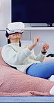 VR headset, woman or goggles with interaction in home for user experience, gaming entertainment or metaverse. Girl, virtual reality or gadget for 3D exploration, simulation or cyber fantasy in house