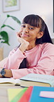 Education, face and teen with books in home, growth and writing homework with textbook and learning. Happy, student and girl with finished assignment, knowledge and academic development in house