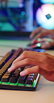 Typing, keyboard and hands of man gaming in home with frustration, upset or stress for losing. Esports, cyber and male gamer with technology for video game with subscription by desk in apartment.