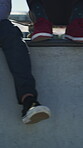 Skateboard, relax and legs of friends on ramp in skatepark for extreme sports, agile tricks or balance. Skating, grind technique and culture with shoes of people outdoor for urban and street league