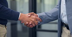 Business, office and hands of people with handshake for finance deal, merger and partnership. Corporate, collaboration and workers with agreement for financial venture, investment and negotiation
