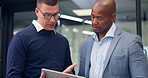 Businessman, tablet and discussion with team in hallway with pitch, review or report at insurance agency. People, broker and advisor with tech, application and feedback for risk management in office
