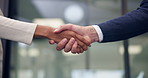 Office, hands and business people with handshake for agreement, finance deal and partnership. Corporate, collaboration and workers with greeting for financial venture, investment and b2b negotiation