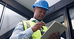 Black man, tablet and engineer on office with stress, notes or low angle for construction project. Person, technician or architect with tech, app or helmet for mistake with review at property agency