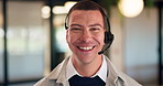 Man, headset and happy with face at call center, laugh and customer service job at insurance company. Person, agent and consultant with voip, smile and portrait with career at risk management agency