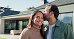 Face, love and couple for new house, outdoor and real estate with kiss and smile. Excited, portrait and home with happy man and woman in backyard for property, mortgage or investment together