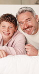 Love, dad or boy in bedroom with face, childcare or bonding together for child growth. Laugh, portrait or family in home with hug, healthy relationship or parent connection for childhood development.
