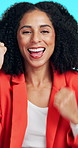 Face, fist pump and success with woman in studio for celebration of goals or target as winner. Opportunity, promotion and yes with excited person on blue background for cheering or satisfaction