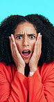 Face, shock and woman in studio with fear, announcement and wtf reaction on blue background. Portrait, surprise and person with open mouth for gossip rumor, bad news and omg for unexpected info