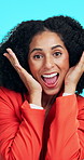 Face, businesswoman and excited in studio with promotion announcement, good news and work opportunity. Happy, person and celebration with job achievement, bonus or positive mindset on blue background