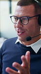 Call center, headset and man with customer support, advice or virtual communication in office. Tech agent, person or happy consultant with talking for help desk, problem solving or website service