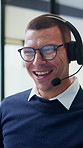 Call center, telemarketing and man for communication, sales or talking of premium benefits. Business agent, headset and happy discussion in office with customer review, feedback or insurance offer