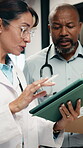 Doctor, team and management with tablet for hospital schedule, planning and healthcare task. Document, digital and medical people with nurse for communication, leadership and solution in clinic