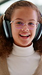 Girl, face and student with headphones for video call, online lesson or virtual class in home. Portrait, child or kid with wave, glasses or talking in POV for education, elearning or communication