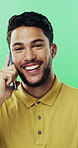 Face, phone call and man in studio, funny conversation and feedback with contact on green background. Communication, talking and portrait of happy person with mobile, story or laughing at joke
