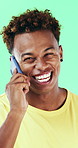 Face, phone call and man laugh in studio, discussion and feedback with contact on green background. Mobile, conversation and portrait of African person with gossip story, communication and funny joke
