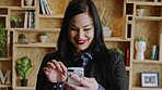Phone, business and happy woman in office for career, hr or job search with new recruitment app. Typing, smile and talent acquisition specialist with communication, results or social media for hiring