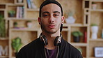 Man, face or student with headphones for internship, learning program or creative career. Portrait, male person or gen z with intern designer for job opportunity, development or growth in university