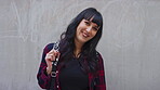 Happy woman, face and education at university, wall and laugh with study opportunity or scholarship. Outdoor, student and person with smile for college funding, mockup space and punk fashion in USA