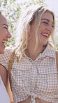 Happy women, hug and laughing with friends in nature for outdoor bonding or social gathering. Female people, humor or comedy with smile for friendship, inclusion or funny interaction together in park