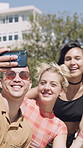 Happy people, friends and city with selfie for outdoor memory or capture moment together. Group, smile or peace sign with students in an urban town for photography, picture or social media post