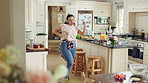 Woman, headphones and dance with spoon in kitchen, meal prep and move with energy in house or silly. Happy person, singing and rhythm with phone for music, cooking and celebration with tech in home