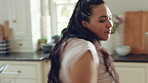 Dance, excited and woman in kitchen with energy for celebration, performance and expression. Dancer, movement and female person with hip hop or groove for rhythm, entertainment or weekend fun in home