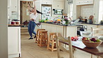 Dancing, woman and spin with spoon in kitchen, meal prep and moving with energy on weekend or goofy. Happy person, singing and stress free with rhythm, cooking and celebration for success in house