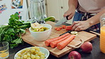 Happy, dance and woman cooking in kitchen with good mood, breakfast and healthy food at home. Excited, singing and person eating vegetables for nutrition, wellness and listening to music on weekend