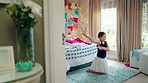 Ballet, child and dancing in costume in bedroom for learning routine, flexible movement and talent. Girl, ballerina tutu and choreography in home for performance practice, recital rehearsal or growth