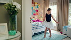Ballet, child and spin in costume in bedroom for learning dance routine, movement and rhythm. Girl, ballerina tutu and choreography in home for performance practice, recital rehearsal or development
