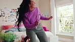 Dancing, energy and woman with music in bedroom for me time, good vibes and relax on weekend. Home, happy and person with audio, playlist and album for movement with groove, rhythm and positivity