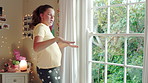 Dancing, music and teenager in bedroom with energy, rhythm or practice for performance with radio. Groove, creative and girl moving to playlist on weekend with growth, fun and development in house.