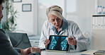 Tablet screen, xray and doctor with man in clinic for treatment plan, healthcare or explaining. Digital technology, consultation and medical worker with male patient for radiology scan in hospital.