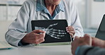 Hands, tablet and doctor with patient for x ray, consultation and explaining medical diagnosis. Screen, healthcare and professional person with tech for injury, results of accident and advice