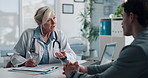 Doctor, talking and clipboard with man for checkup, symptoms notes and medical results. Woman, consultation or person with evaluation checklist in office, patient information and healthcare treatment